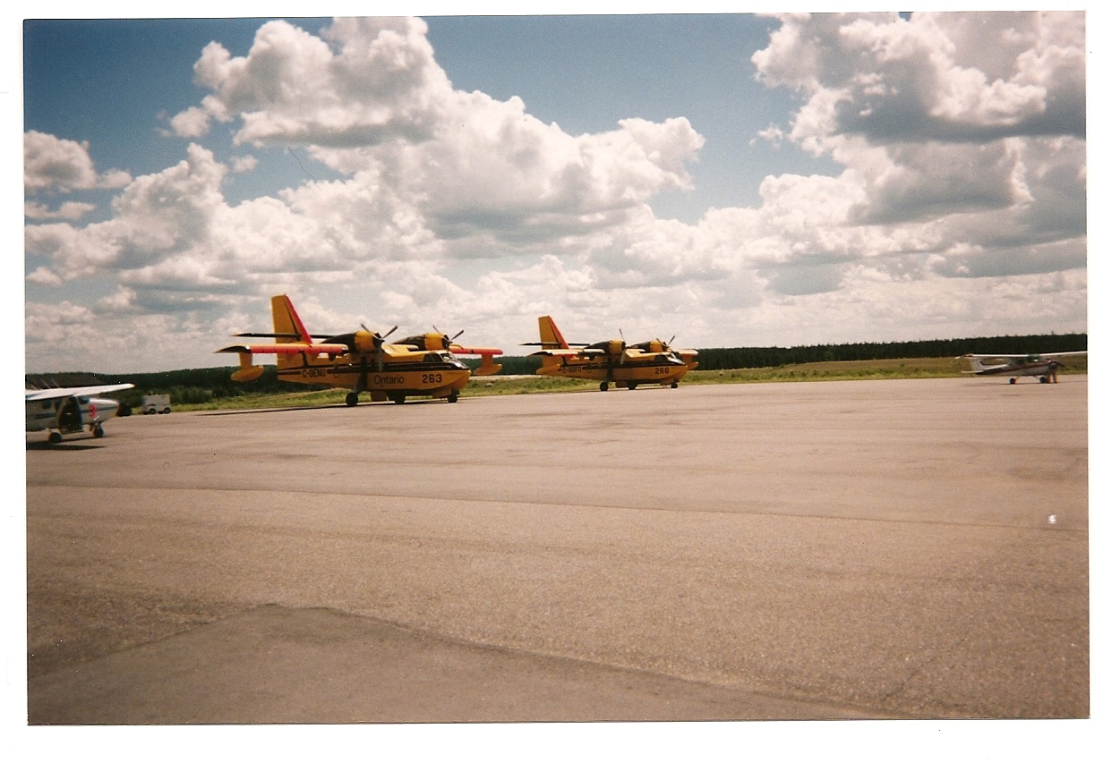 Two CL-415's waiting on the tarmac